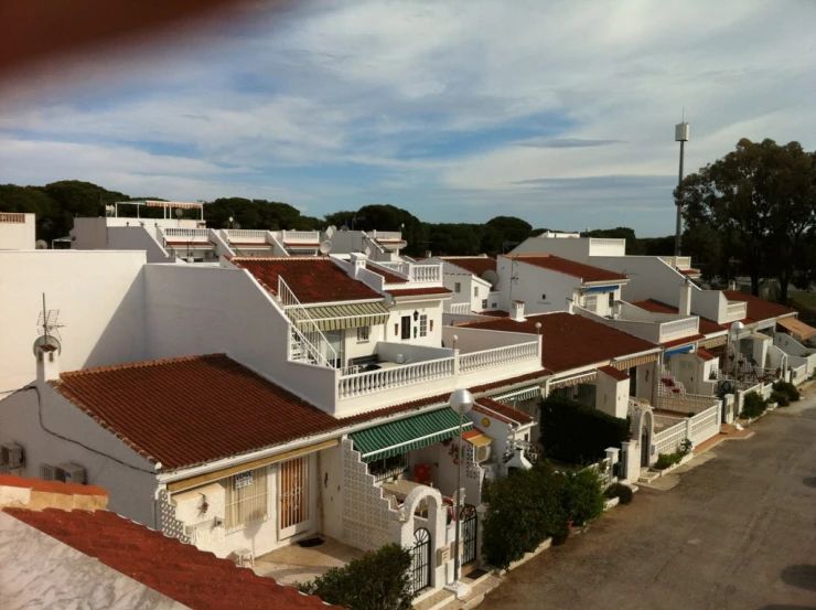 white buildings are shown with a sky background