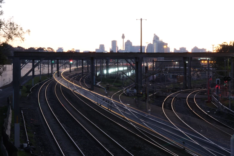 a train track going by a big city