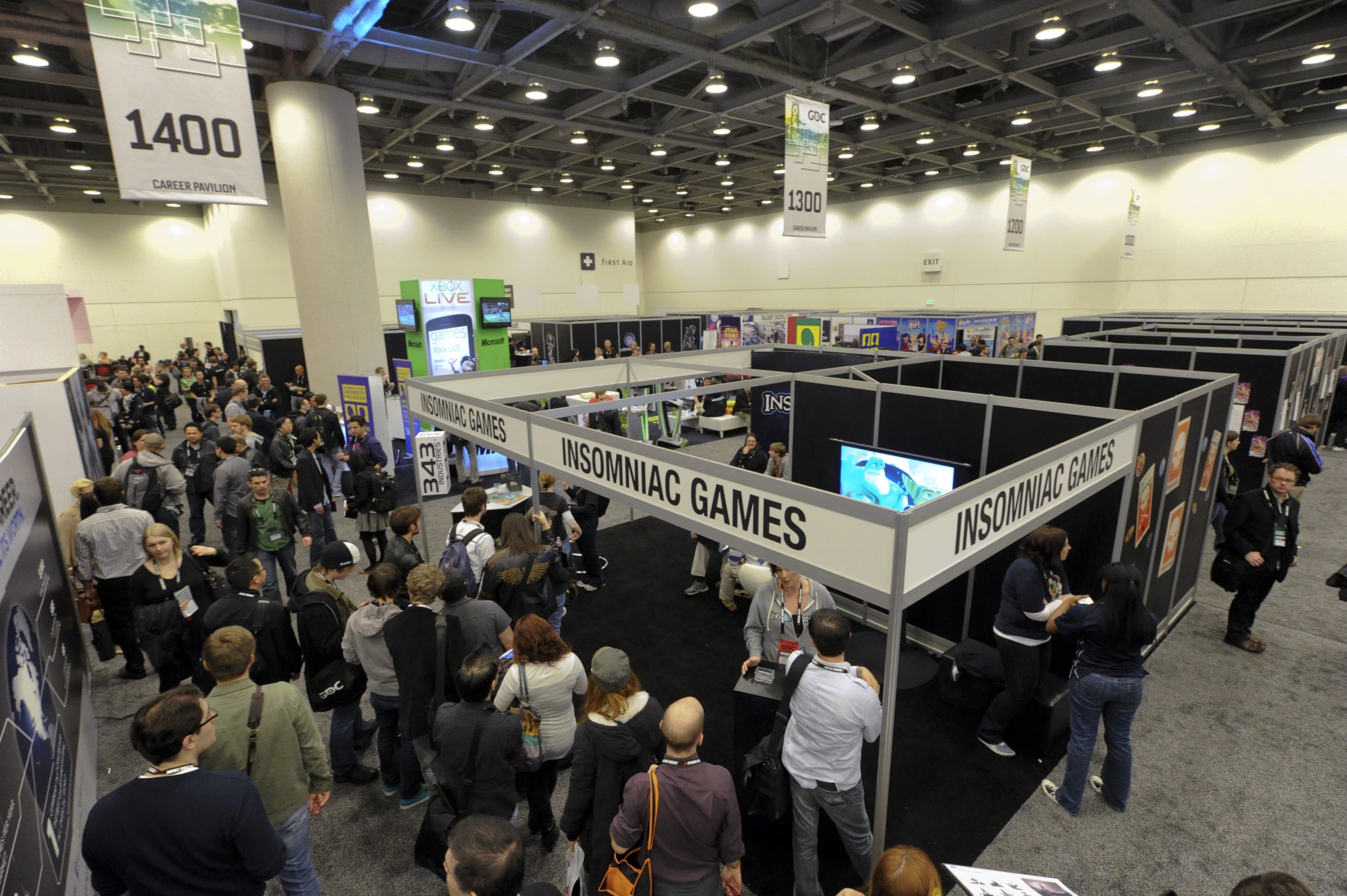 a crowd of people are gathered in a room