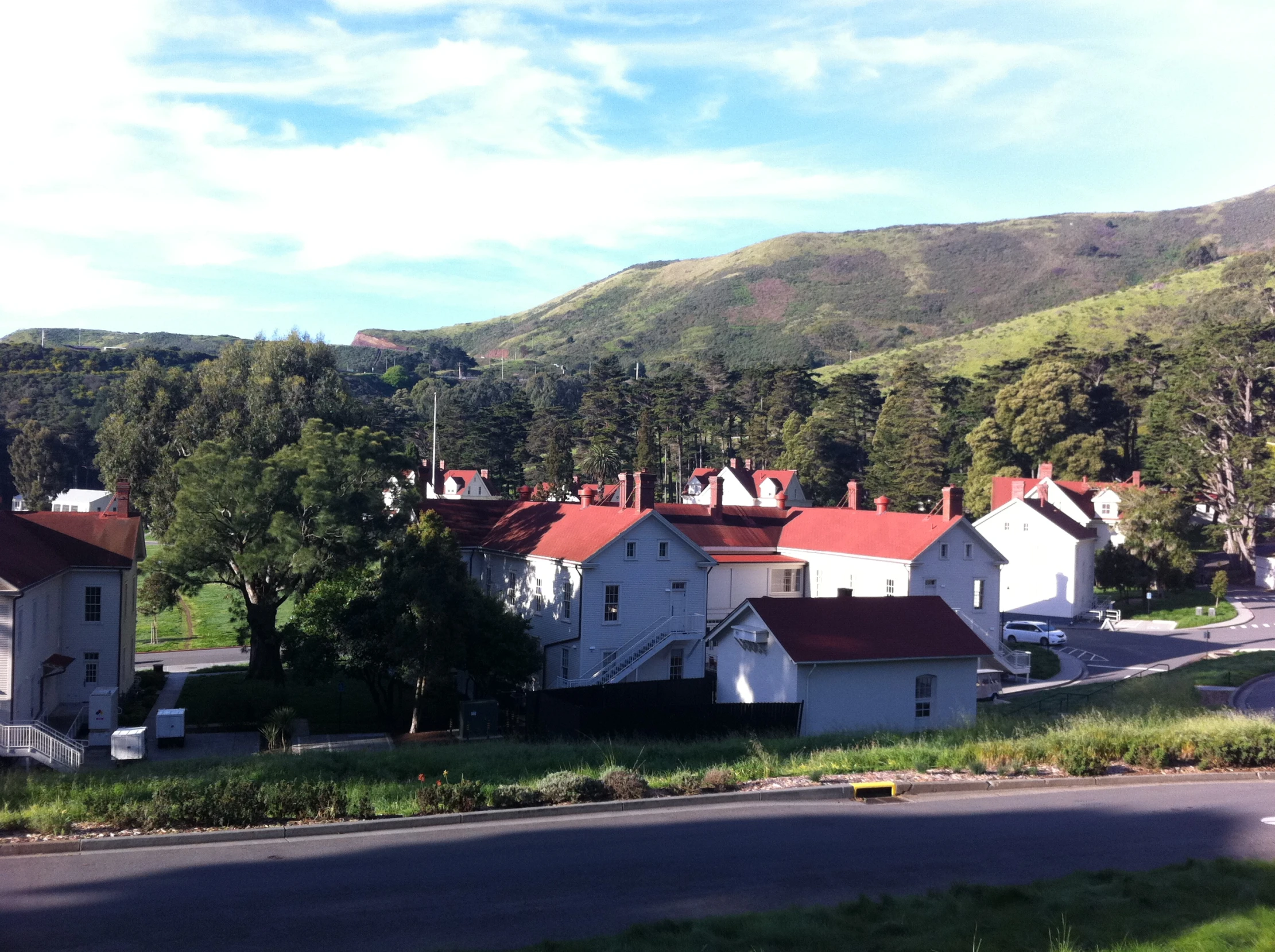 a rural setting with a very tall mountain in the background