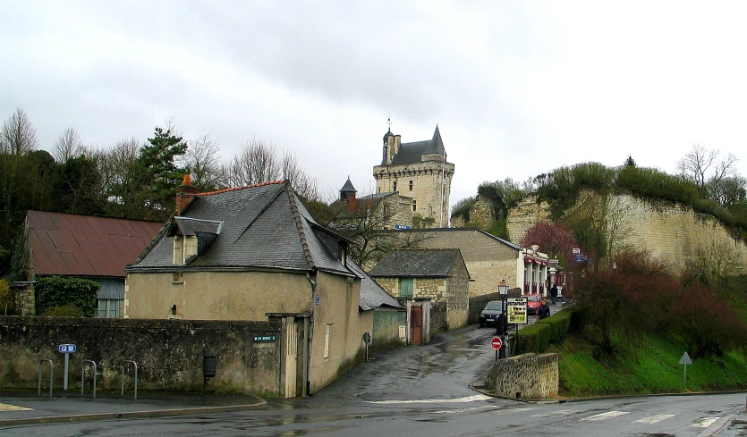 small village with a tall tower in the background