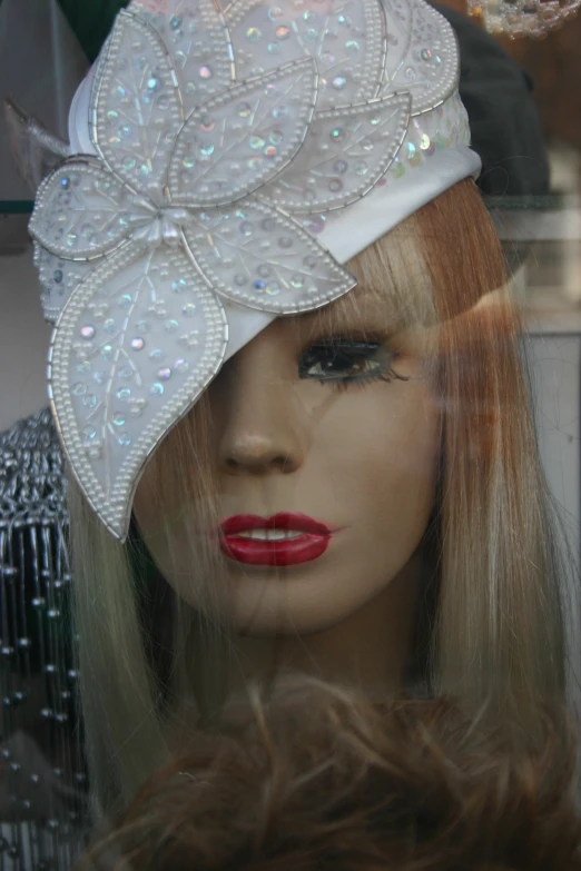 a female mannequin is standing in front of a display