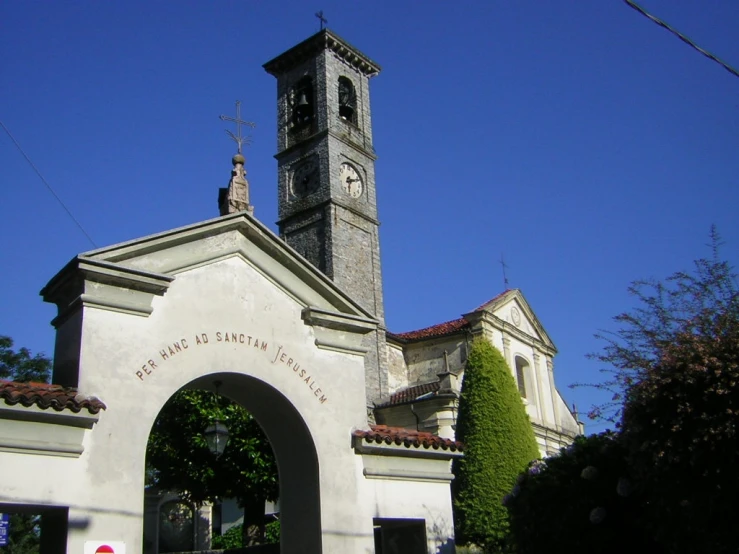 an older style church with its clock tower