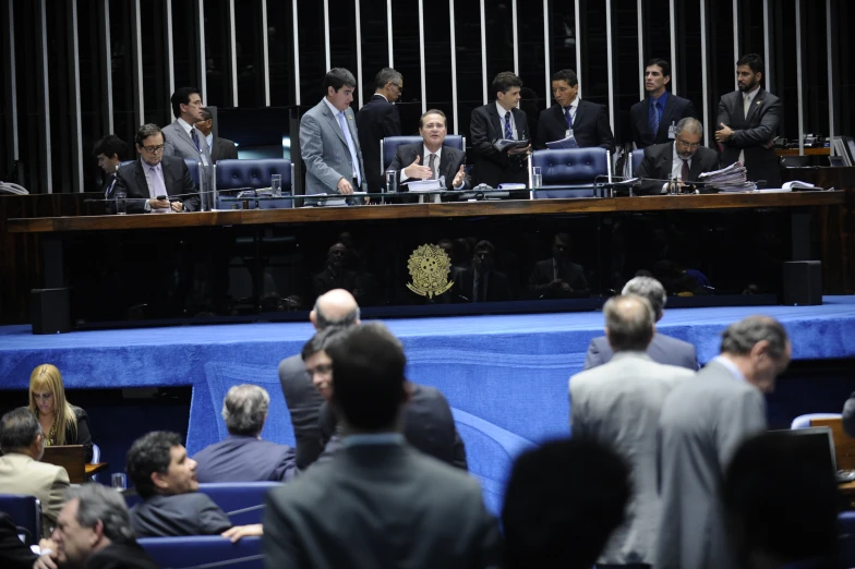 a large group of people sitting at tables