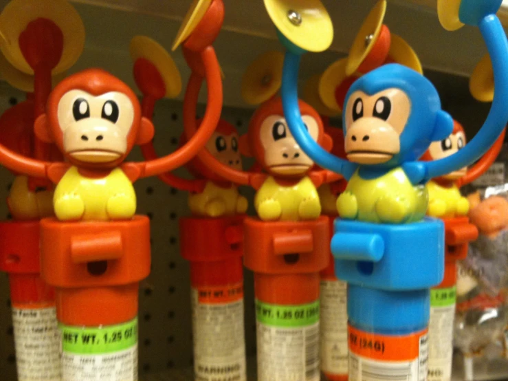 toy monkey toys are on display in a store