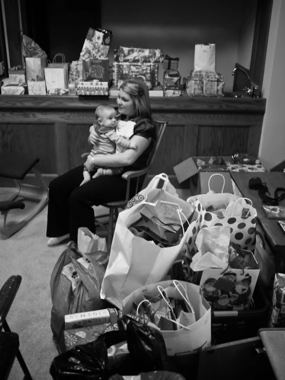 a woman and her baby on the couch