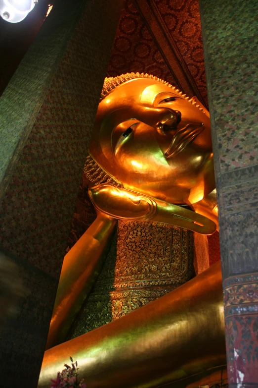 an asian shrine is illuminated by light in the night