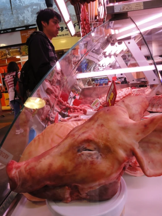 a large meat store displays a variety of different meat