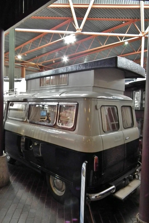 a vehicle parked on display inside of a building