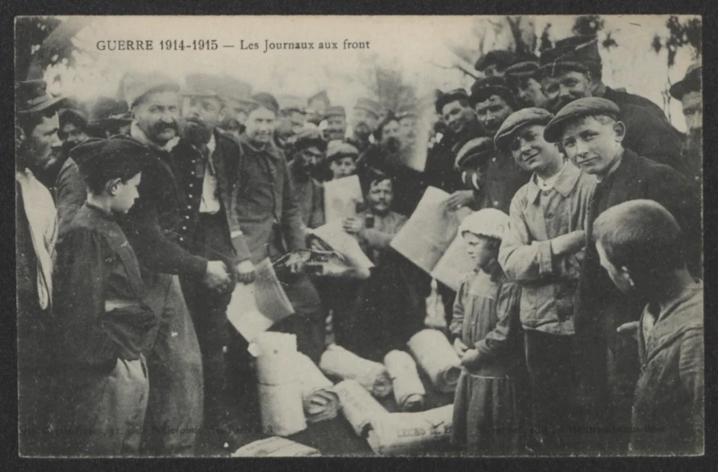 some people standing around and one holding papers