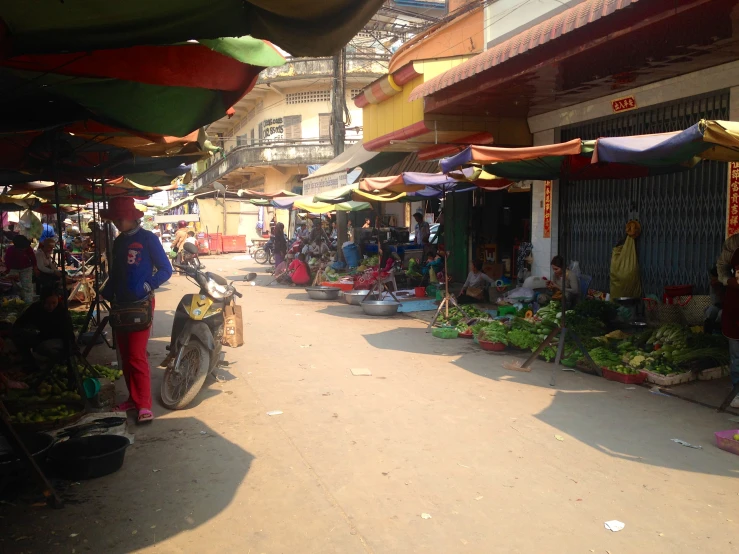 a view of an open air market with people