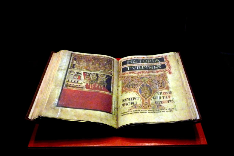 an open book with an ornate design inside