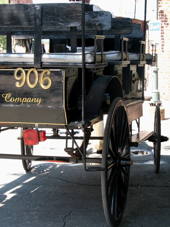 there is an old model carriage that has had its name written