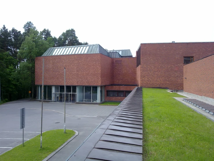 large brick building with steps to the ground