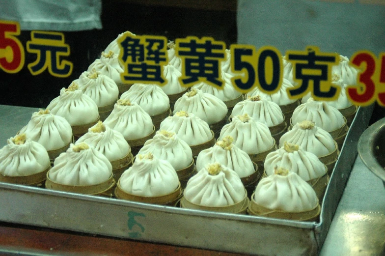 there are several desserts sitting on the tray