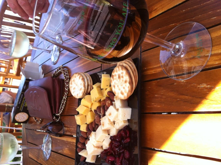 a plate of ers, chocolates and cheese on a table