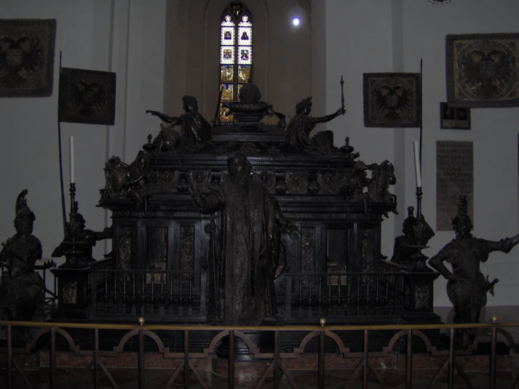 an old gothic church interior with a clock and alter