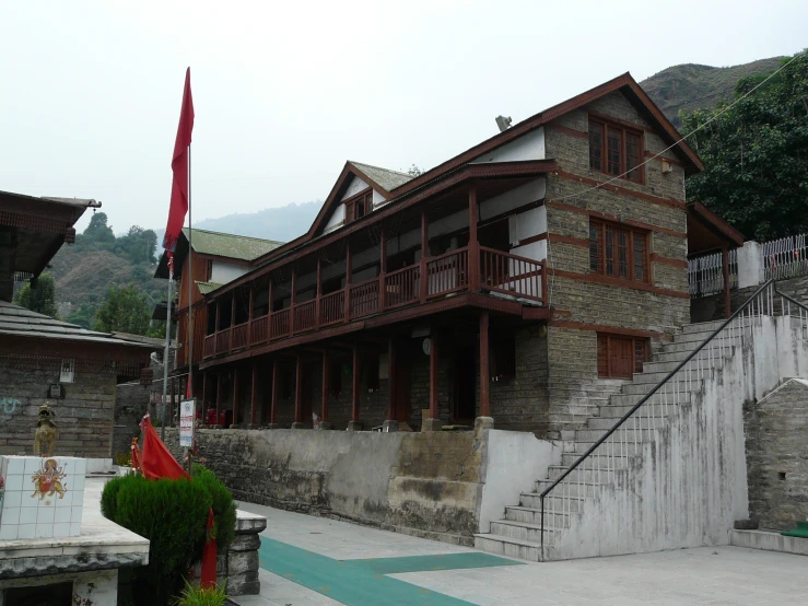 a large wooden house that looks old but pretty