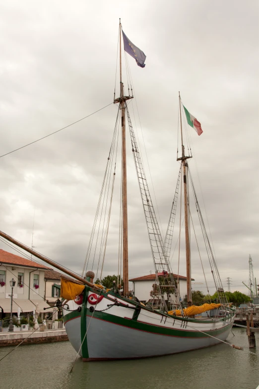 the boat is moored and sitting in the water