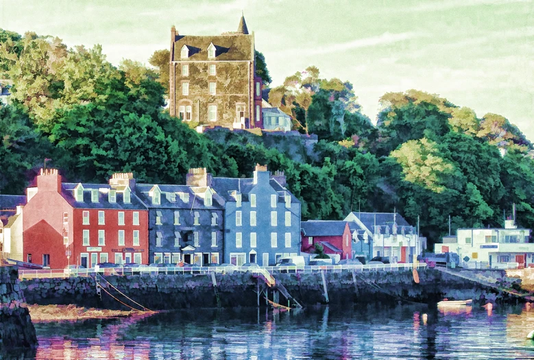 houses sit at the edge of a body of water