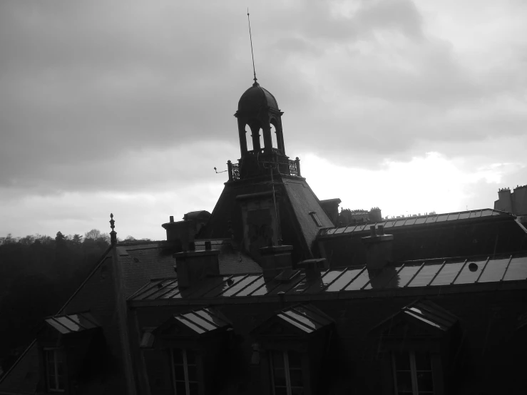 a steeple on the roof of a building