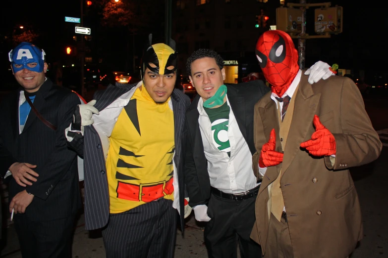 four men dressed up in costumes on the street