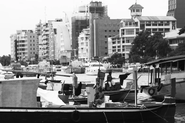 the boat is tied up near the other boats