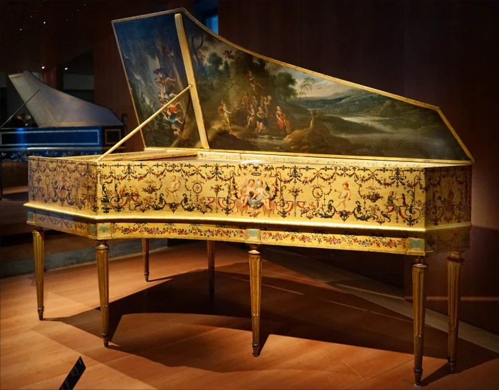 a large ornate and well kept grand piano