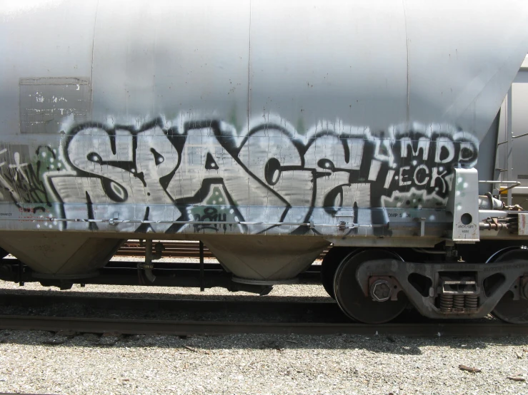 train car with graffiti on the side of it