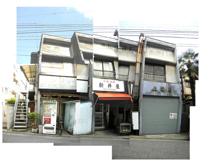 a large building with a small entrance to it