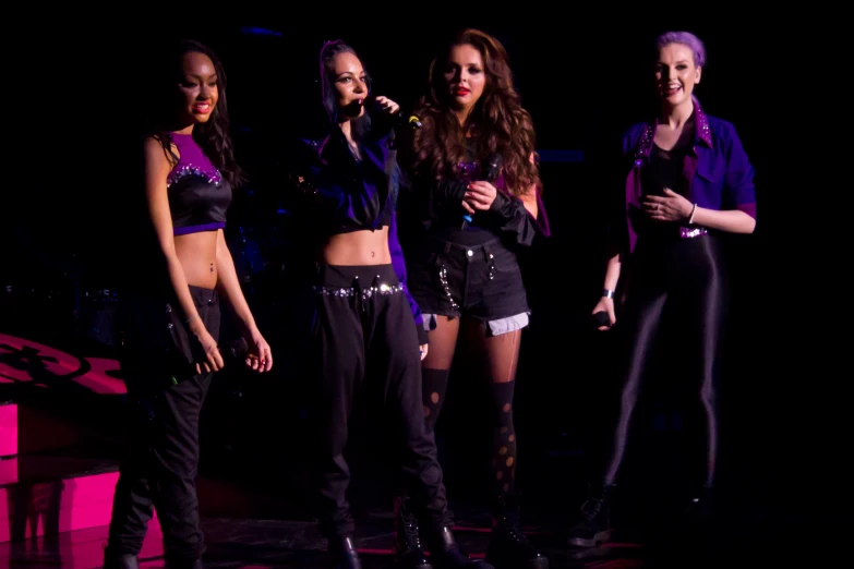 the girls are dressed in all black
