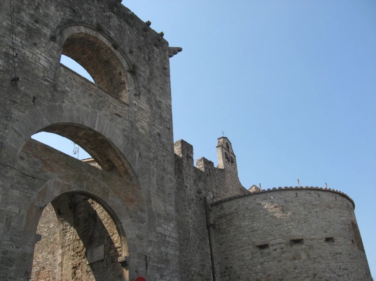 the building has arches and windows that make it look like a castle