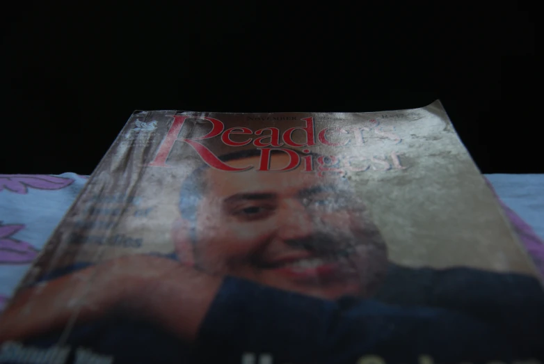 a magazine with an image of a man