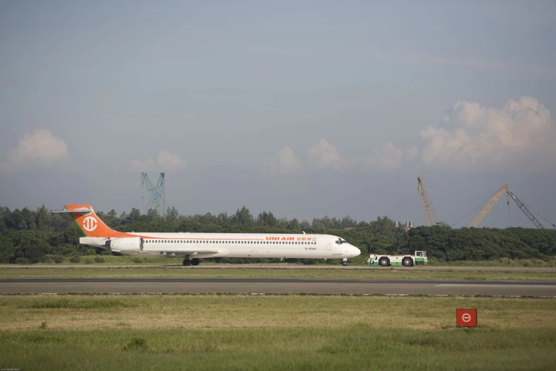 a large airplane on the run way at the airport