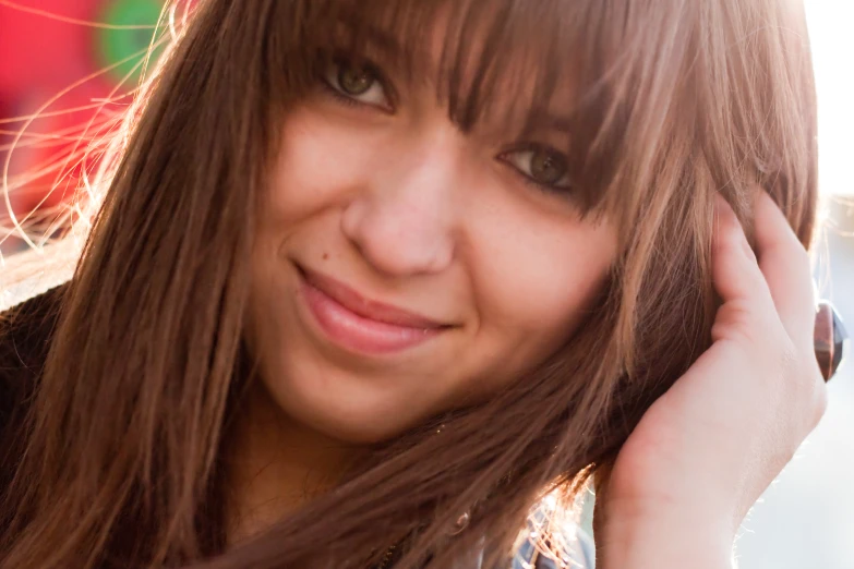 a close up image of a woman with long hair