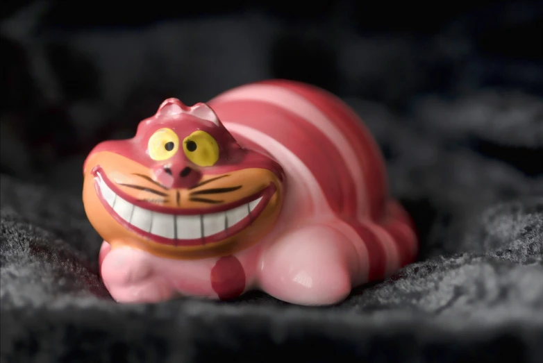 a figurine with an ugly griney face on it