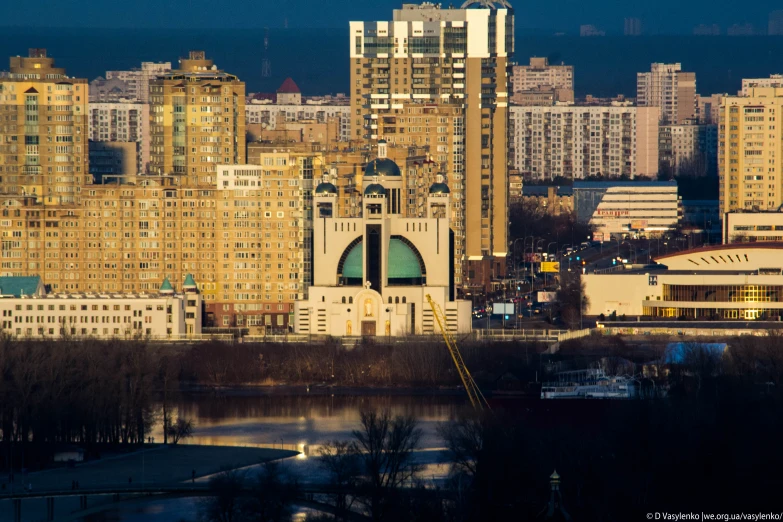 an image of a cityscape taken from a high hill