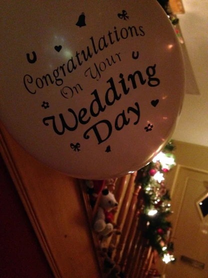 there are balloons that say congratulations on your wedding day