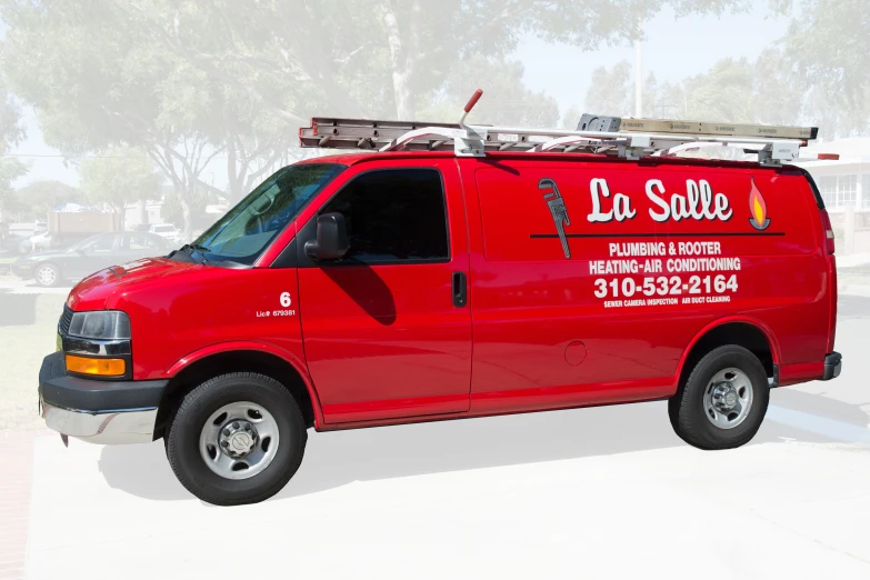 a red van parked in a parking lot