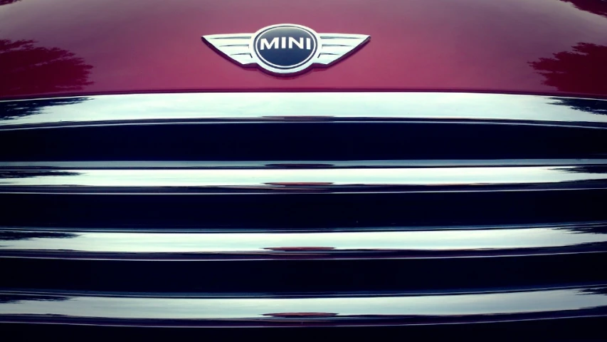 the front end of an old red truck