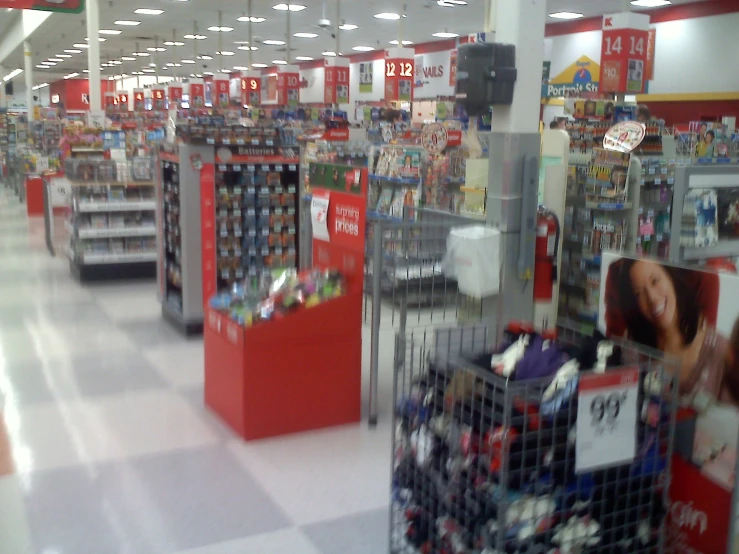 a shopping area with a shelf filled with items