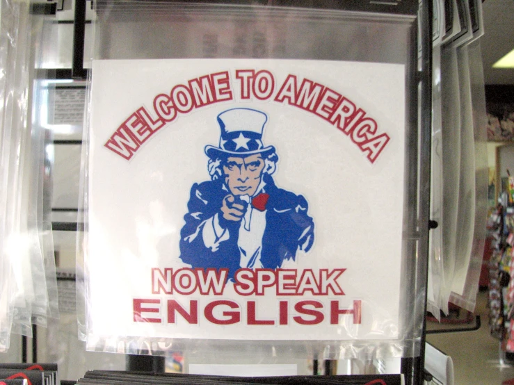 a sign advertising speak english near a store