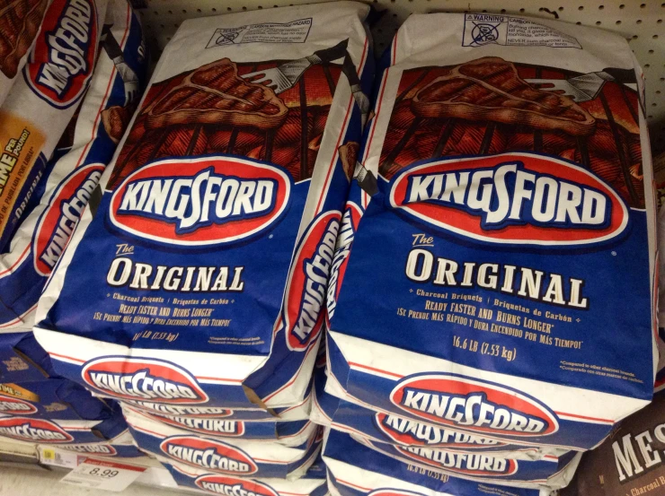 bags of knefford king food is stacked up