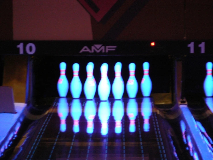 a bowling game with glowing pins
