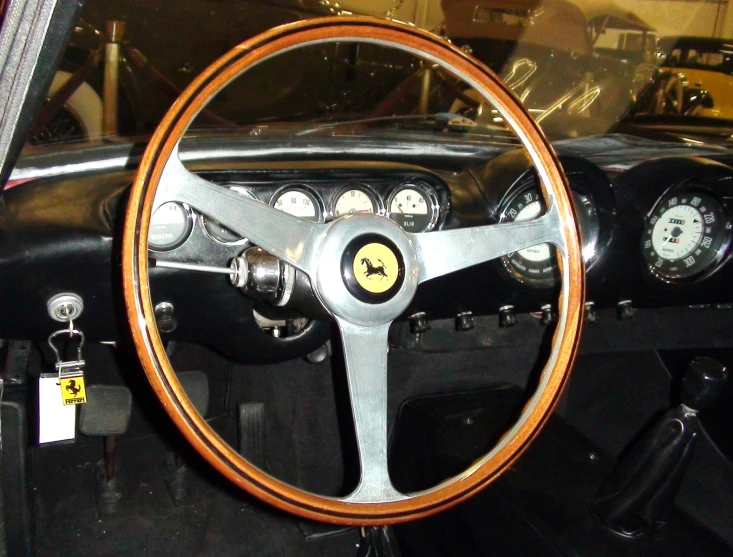 a steering wheel and gauges of a car