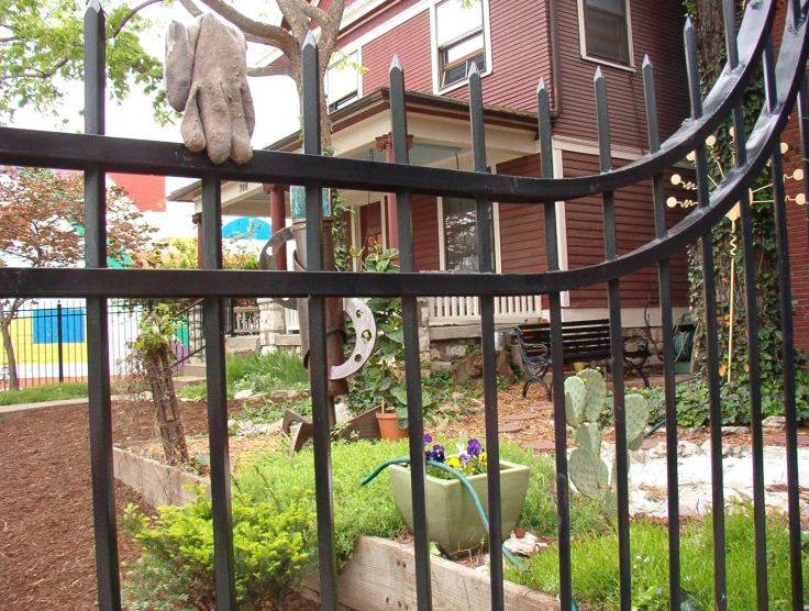 a large white elephant is in an iron gate