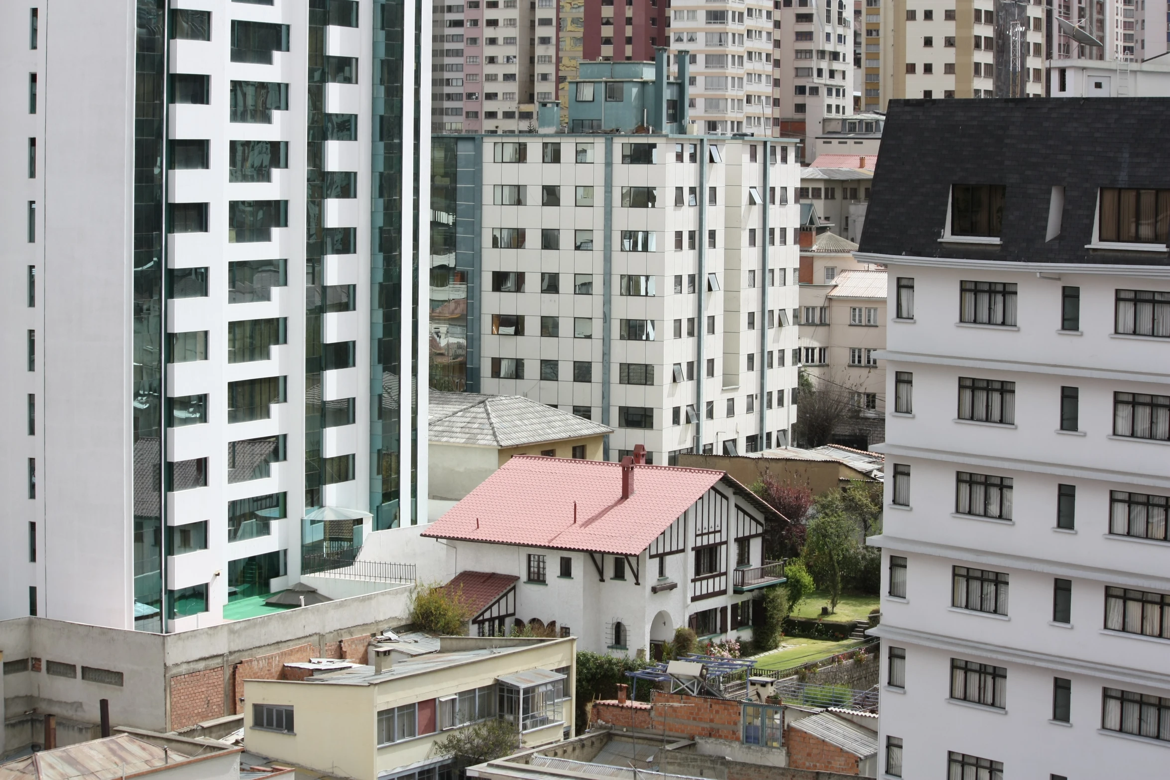 the rooftops of tall buildings in a city