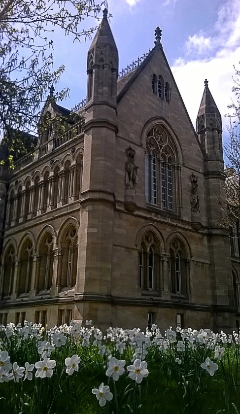 an old building has spires and arches with windows