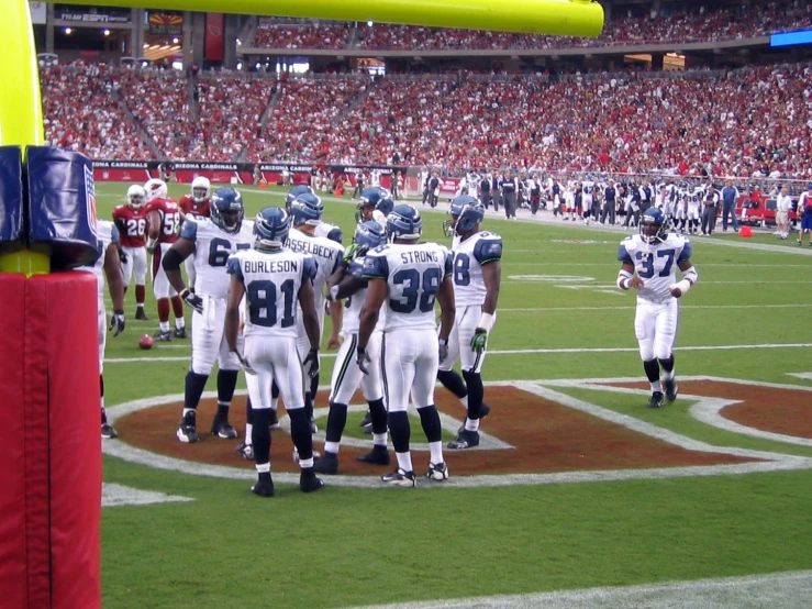 the football team is on the field during a game