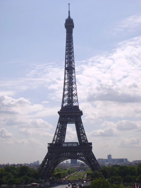 the eiffel tower is tall with many windows